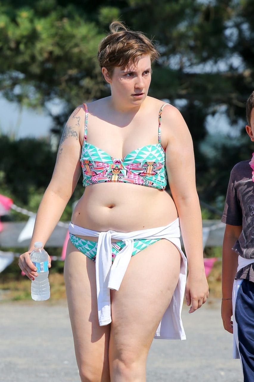 Lena Dunham flaunts her curves in a bikini while attending the 'Paddle For Pink' Event in the Hamptons, NY